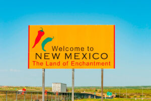 New Mexico's Land of Enchantment highway sign